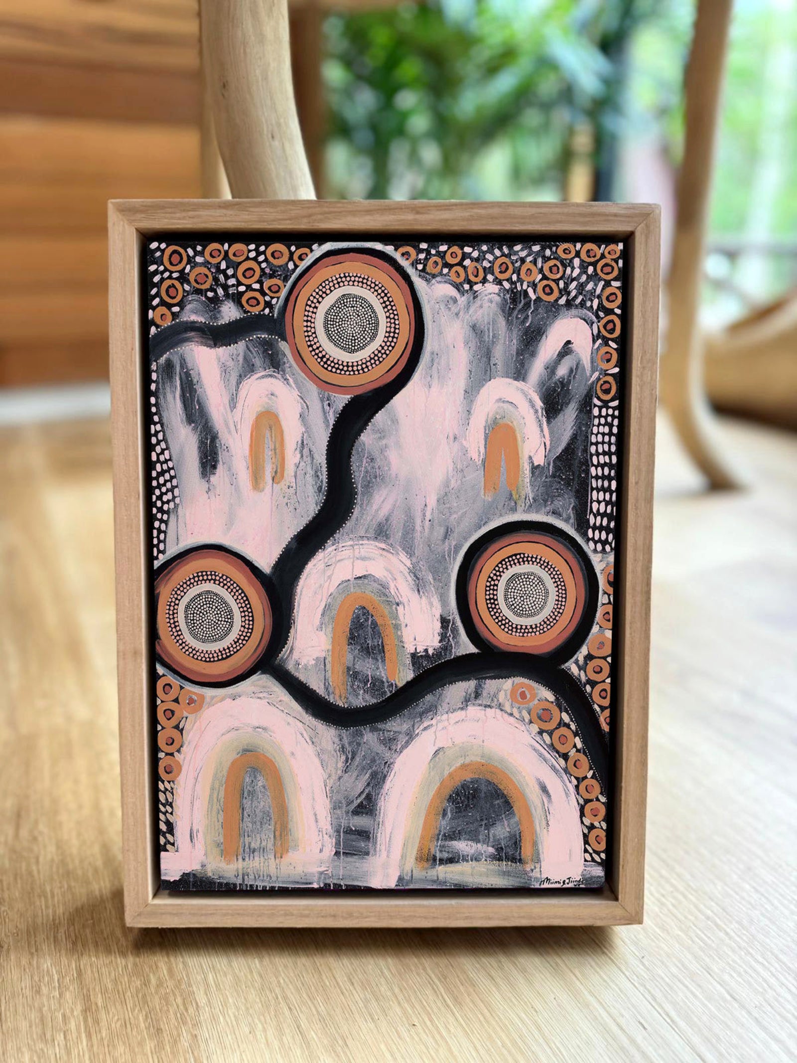 Limited Edition Girrwaa Framed A4 Canvas Print on floor